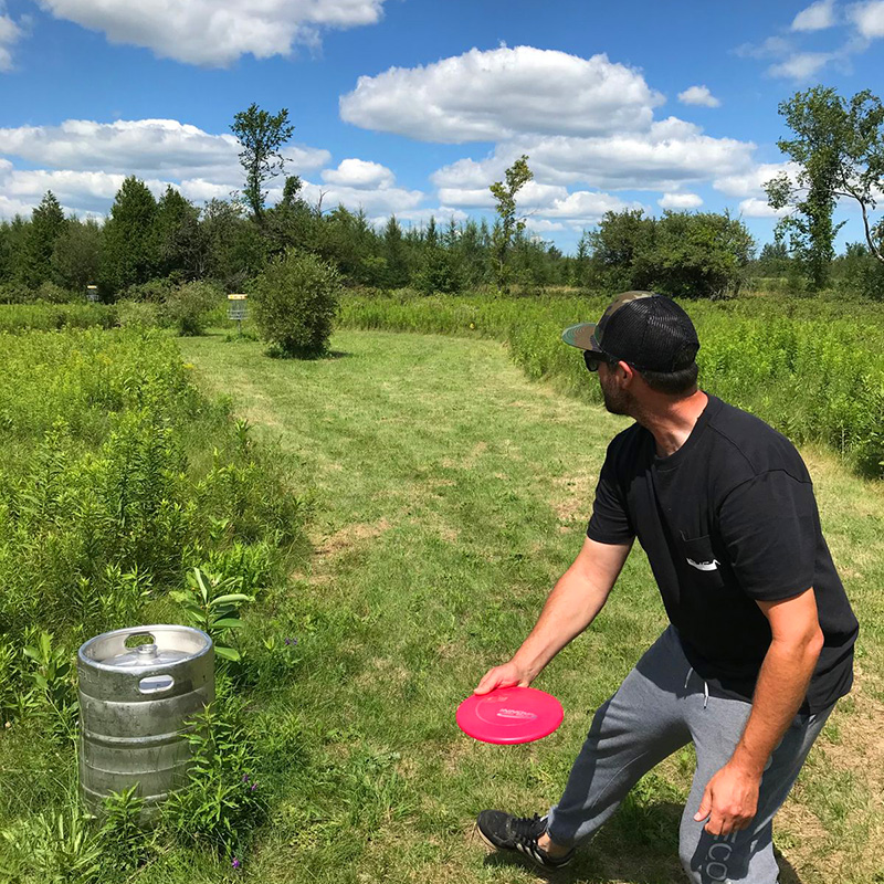 Daytime at Goodlot Farmstead Brewing Co. — enjoy the full 18-hole disc golf course and farm-fresh beer before the Dr. Glow Experience begins at 9PM